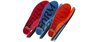 Assorted FORM orthotic insoles in different colors displayed together.