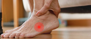 Close-up of a foot with a highlighted area indicating heel pain or discomfort.